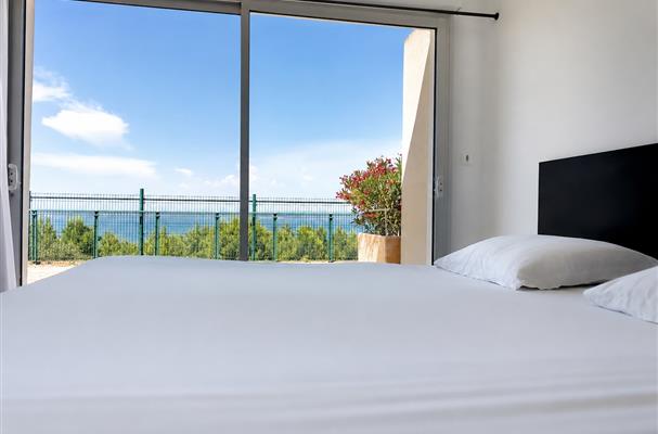 living room with sofa bed and sea panoramic view Residence La Provence 